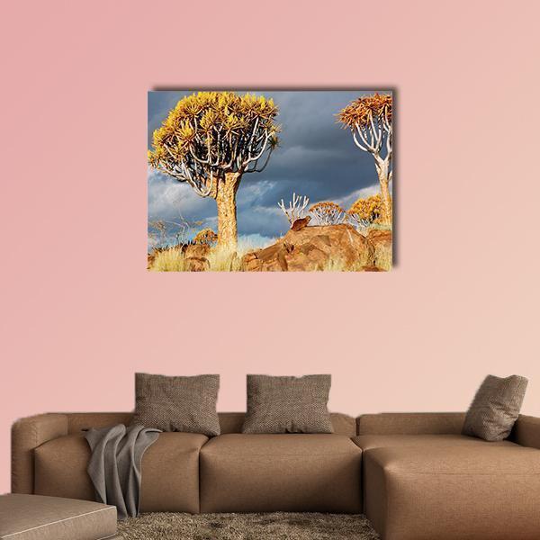 Quiver Tree Forest in South Africa Canvas Wall Art in gray, brown and yellow, single panel hung on a wall