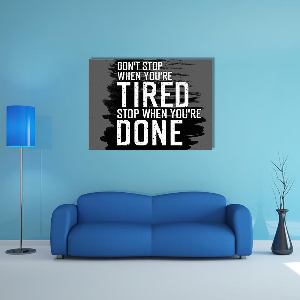 Don't Stop When You're Tired Motivational Quote Canvas Wall Art in black, white and gray, single panel hung on a wall