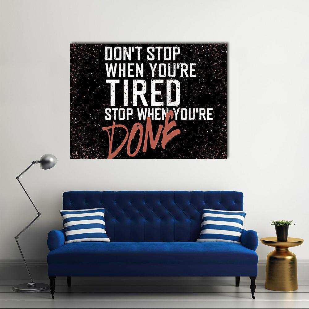 Don't Stop When You're Tired Quote Canvas Wall Art in black and white, single panel hung on a wall