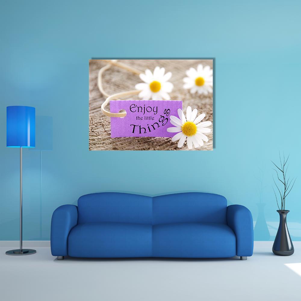 Enjoy the Little Things with Daisies Canvas Wall Art in white, beige and purple, single panel hung on a wall