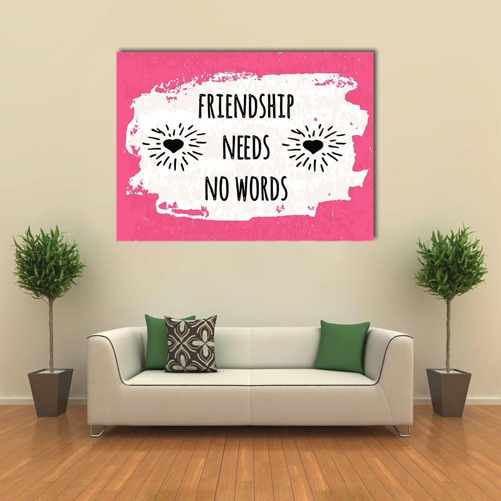 Friendship Needs No Words Quote Canvas Wall Art in black, white and pink, single panel hung on a wall