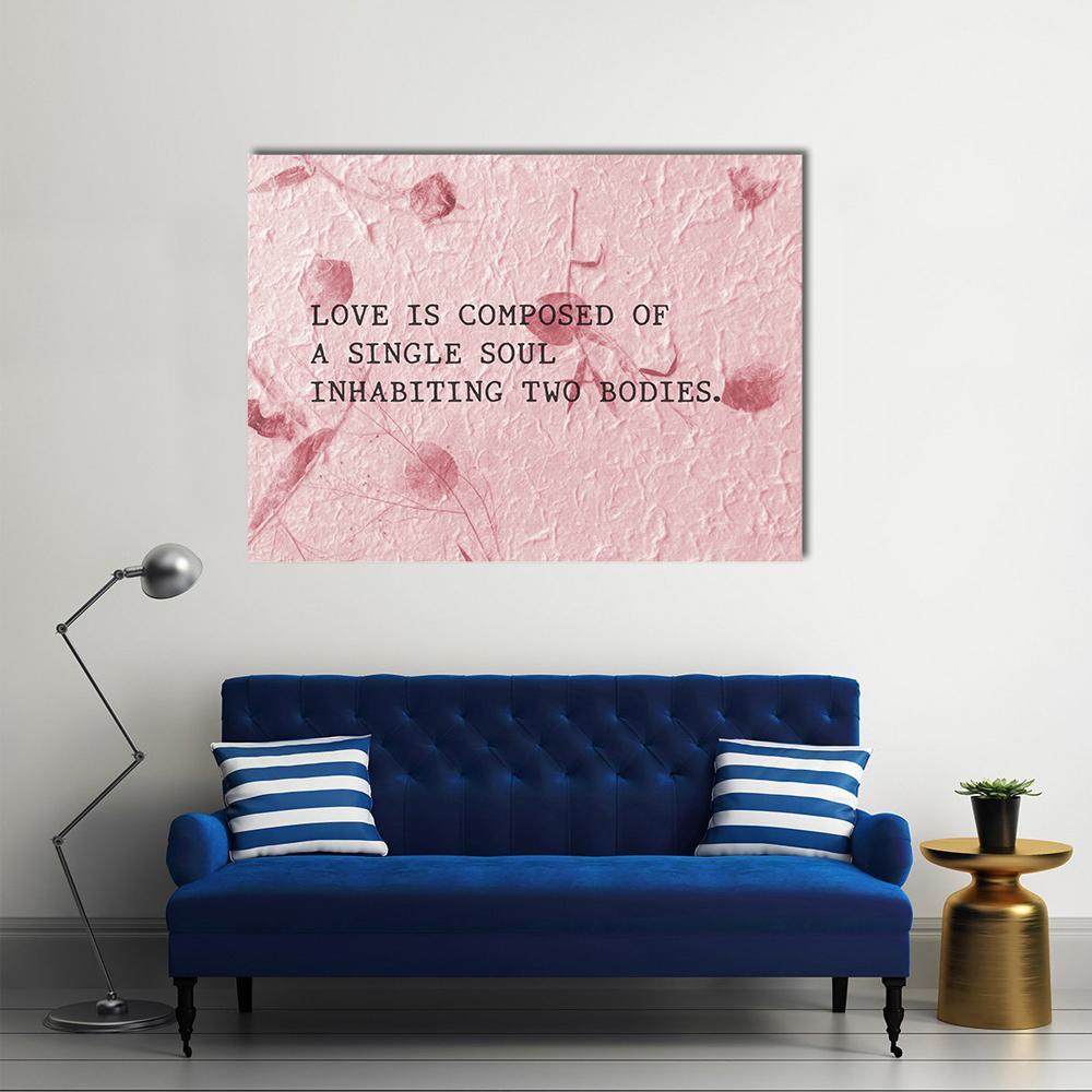Aristotle Love Quote with Floral Texture Canvas Wall Art in pink, single panel hung on a wall