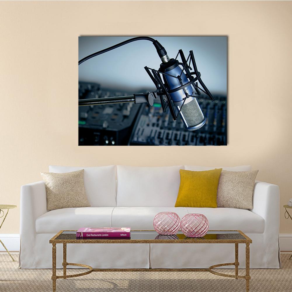 Blue Studio Microphone Close-up Canvas Wall Art in black, gray and blue, single panel hung on a wall