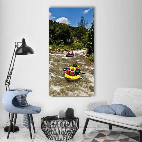 White-water Rafting Race Vertical Canvas Wall Art in brown, green and blue, single vertical panel hung on a wall