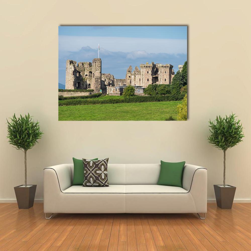 Raglan Castle Ruins Canvas Wall Art in gray, green and blue, single panel hung on a wall