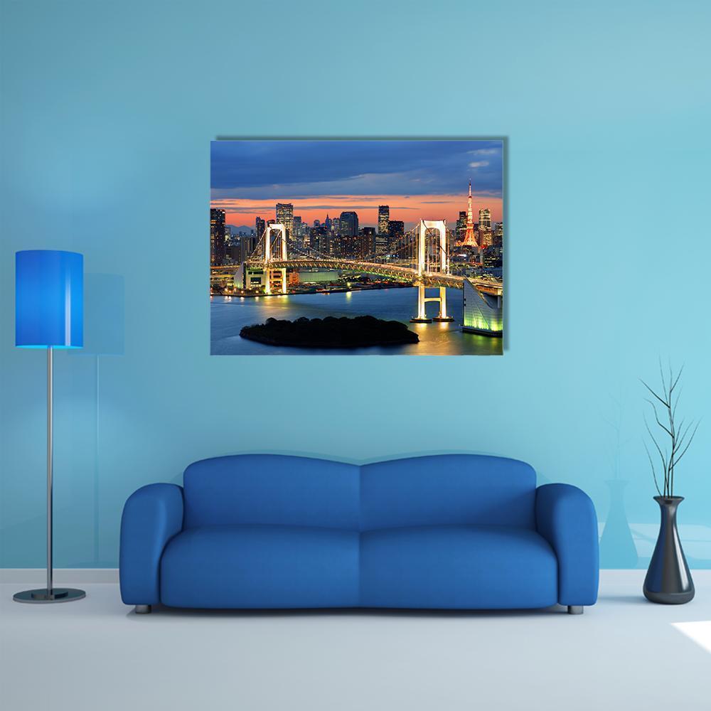 Rainbow Bridge and Tokyo Tower at Night Canvas Wall Art in black, orange and blue, single panel hung on a wall