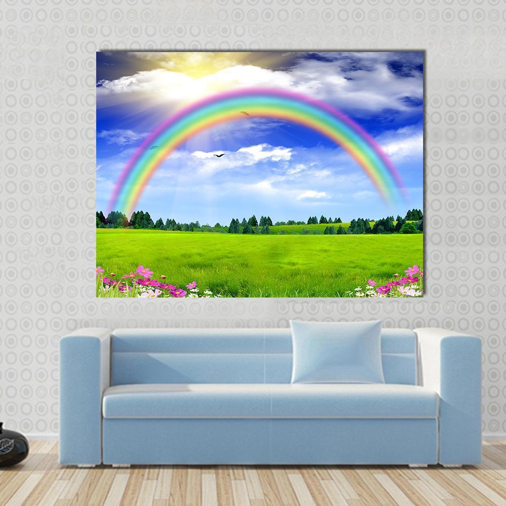 Rainbow Over Blue Sky and Wildflowers Canvas Wall Art in green, blue and multicolor, single panel hung on a wall
