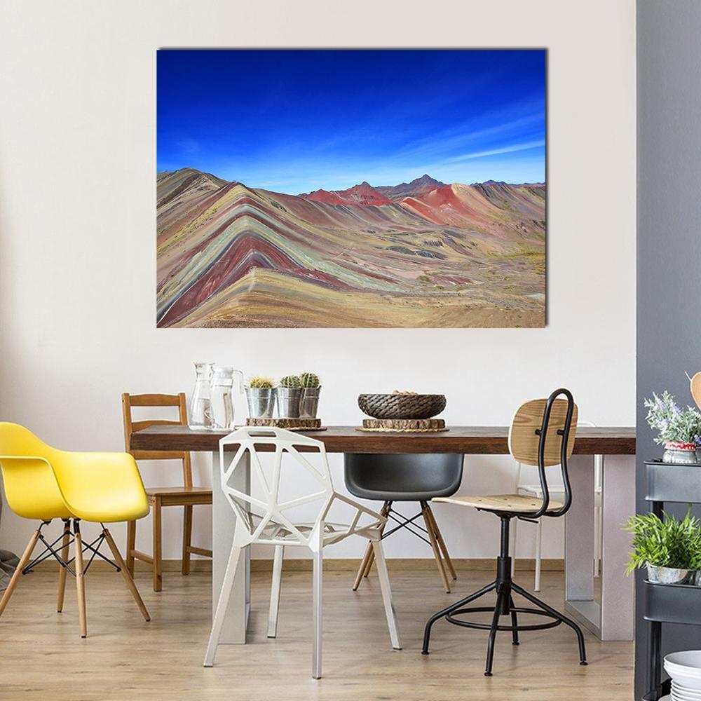 Majestic Rainbow Mountain in Peru Canvas Wall Art in brown, blue and multicolor, single panel hung on a wall