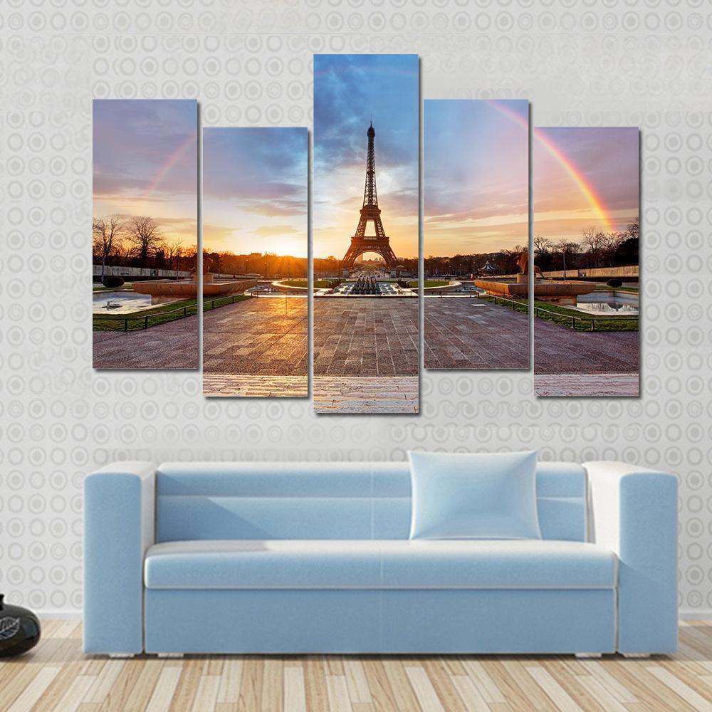 Rainbow Over Eiffel Tower Canvas Wall Art in orange, blue and multicolor, 5 panel Pop layout hung on a wall