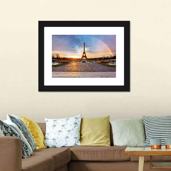 Rainbow Over Eiffel Tower Canvas Wall Art in orange, blue and multicolor, 3 panel horizontal set hung on a wall