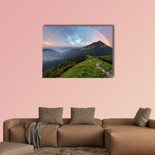 Rainbow Over Mountain Peak Canvas Wall Art in gray, green and blue, single panel hung on a wall