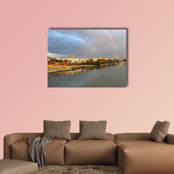 Rainbow Over City Skyline with Golden Domes Canvas Wall Art in gray, gold and blue, single panel hung on a wall