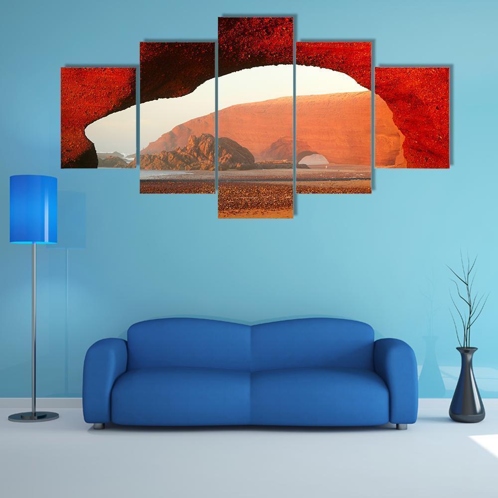 Red Rock Archway at Sunset Canvas Wall Art in brown, red and orange, 5 panel Star layout hung on a wall