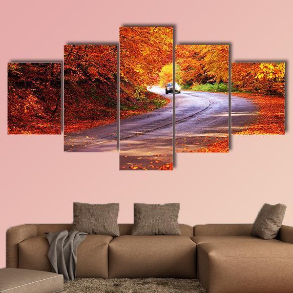 Red Autumn Sunny Road With Blurred Car Canvas Wall Art-5 Star-Gallery Wrap-62" x 32"-Tiaracle
