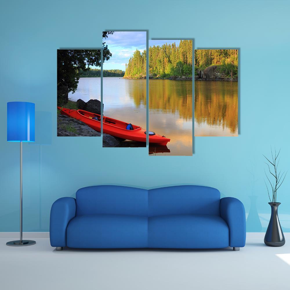 Red Canoe Sitting On Rocks At Lake Canvas Wall Art-4 Pop-Gallery Wrap-50" x 32"-Tiaracle