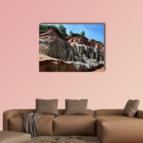 Red Canyon in Vietnam Canvas Wall Art in gray, red and orange, single panel hung on a wall