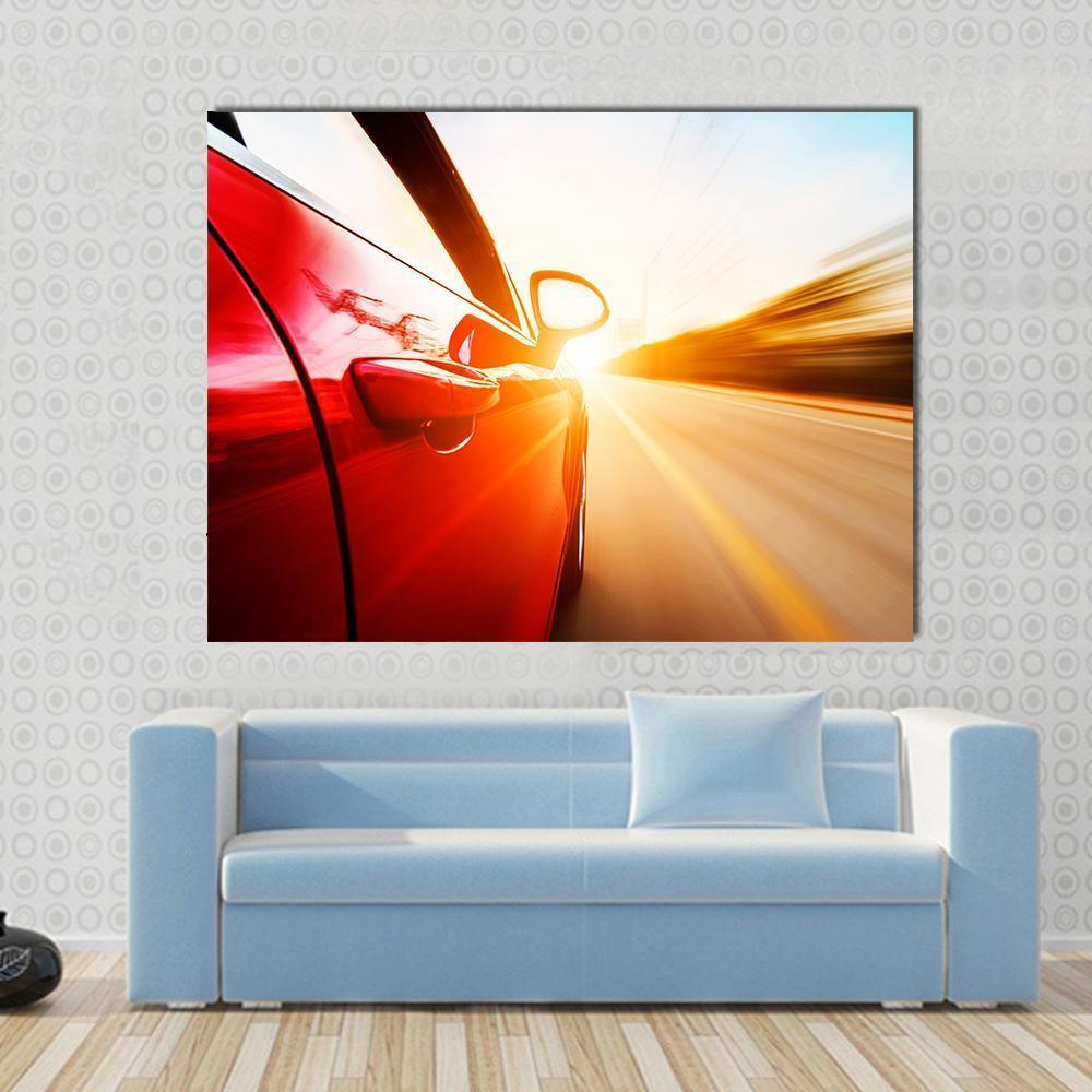 Red Car in High Speed Canvas Wall Art in white, red and yellow, single panel hung on a wall