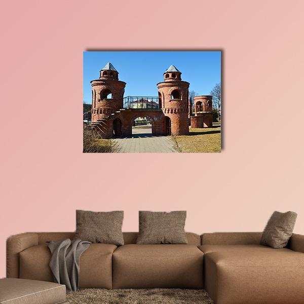Red Children's Castle in Pinsk Belarus Canvas Wall Art in brown, red and blue, single panel hung on a wall