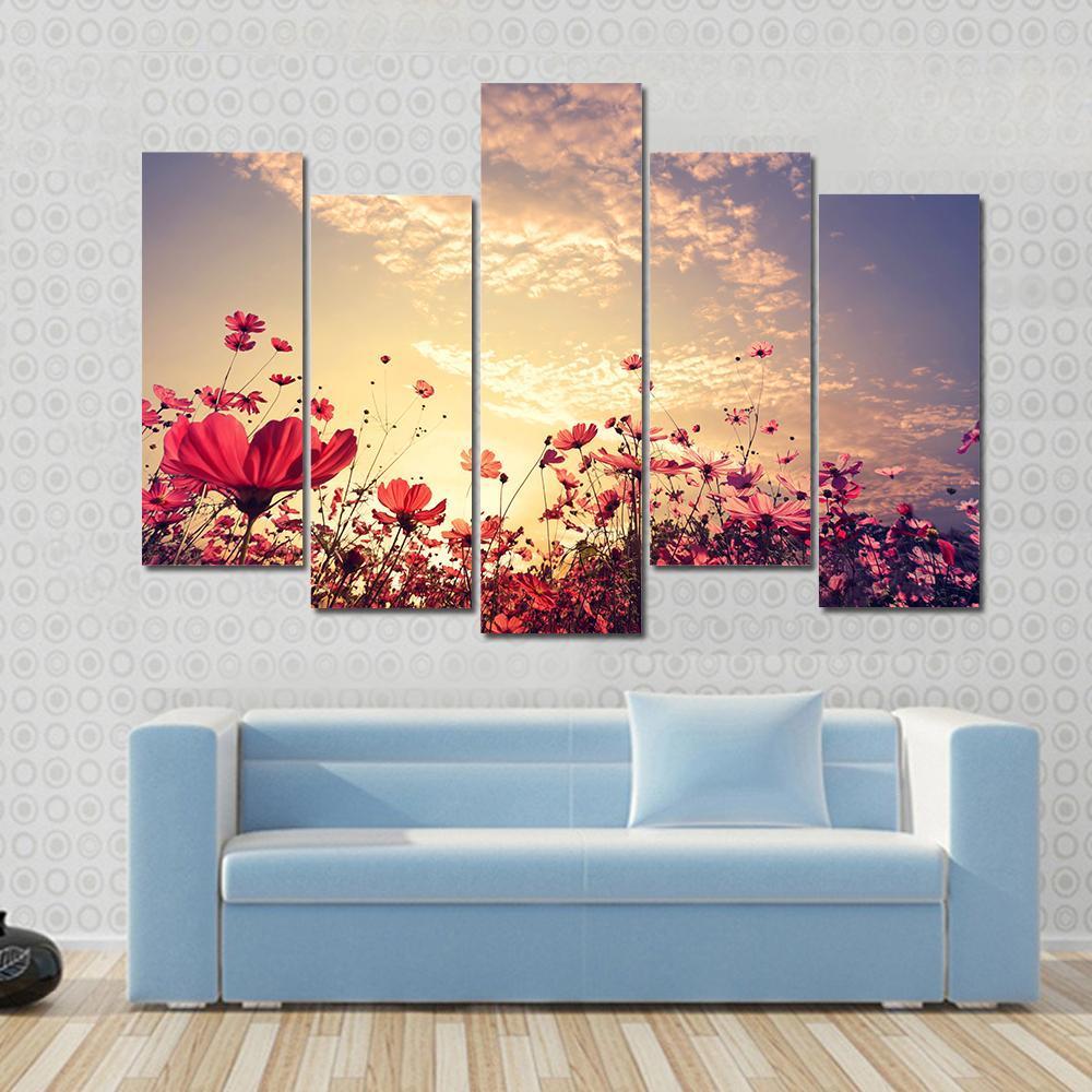 Red Cosmos Flower Field with Sunshine Canvas Wall Art in red, yellow and pink, 4 panel Pop layout hung on a wall