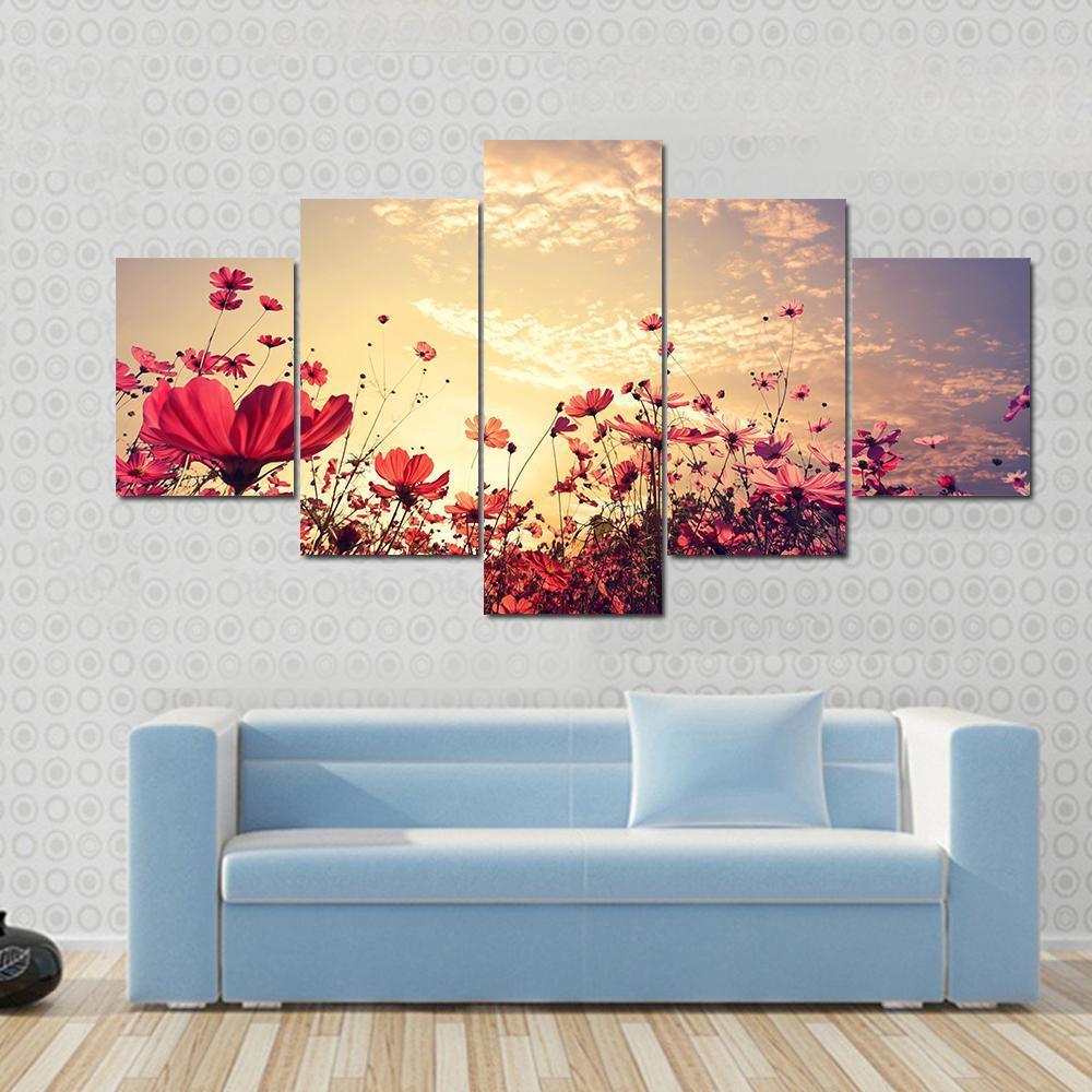 Red Cosmos Flower Field with Sunshine Canvas Wall Art in red, yellow and pink, 5 panel Star layout hung on a wall