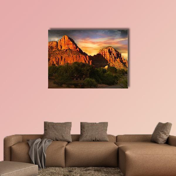 Sedona Red Rock Mountains at Sunset Canvas Wall Art in red, orange and yellow, single panel hung on a wall