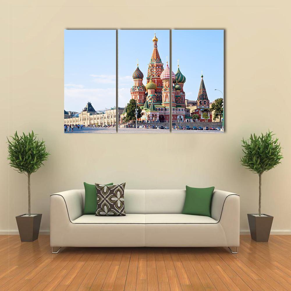 Red Square with Vasilevsky Descent, Moscow Canvas Wall Art in red, blue and multicolor, 3 panel horizontal set hung on a wall