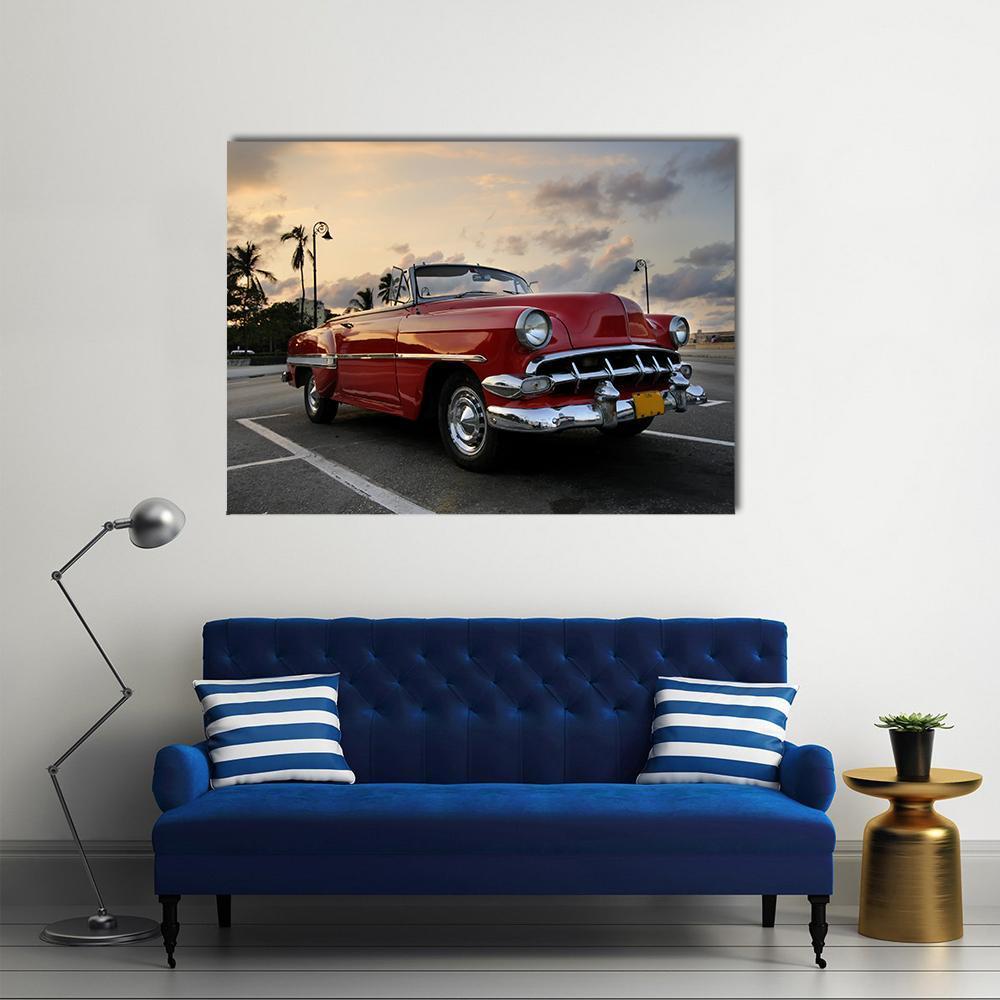Red Vintage Car on Havana Street Canvas Wall Art in gray and red, single panel hung on a wall