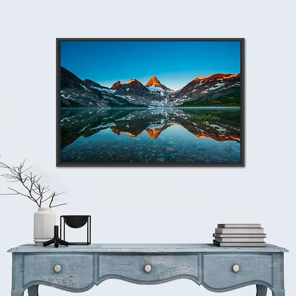 Reflection of Mount Assiniboine Canvas Wall Art in brown and blue, framed canvas, product view on a white background