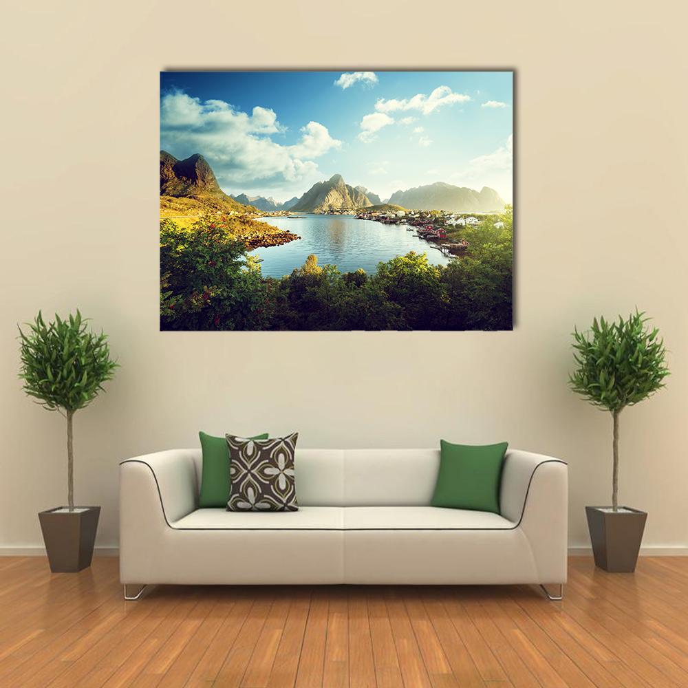 Reine Village, Lofoten Norway Canvas Wall Art in yellow, green and blue, single panel hung on a wall