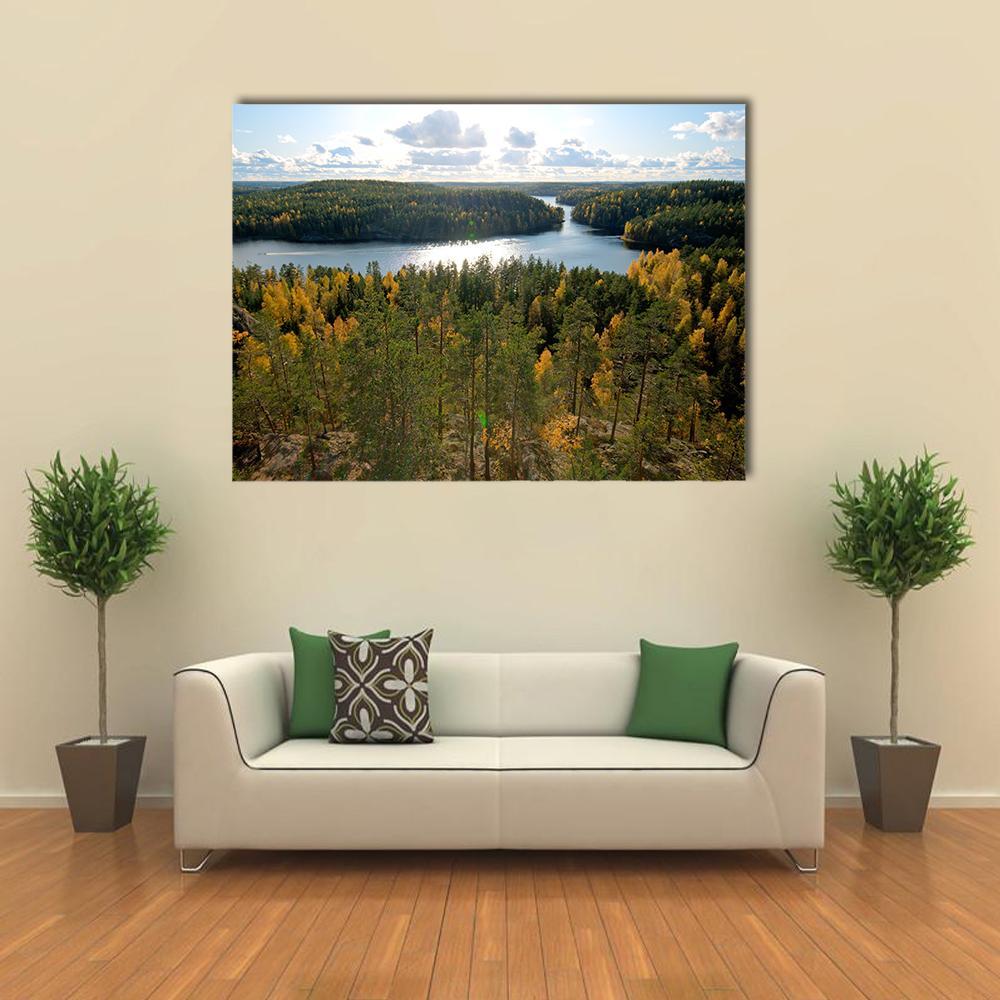 Repovesi National Park Lake in Autumn Canvas Wall Art in yellow, green and blue, single panel hung on a wall