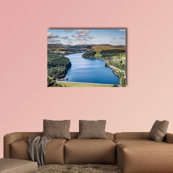 Mountain Valley Reservoir with Dam Canvas Wall Art in brown, green and blue, single panel hung on a wall