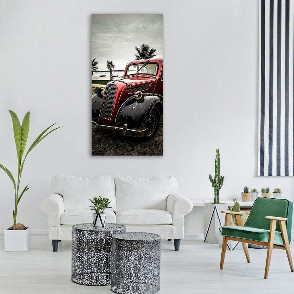 Red Vintage Car with Palm Trees Vertical Canvas Wall Art in black, gray and red, single vertical panel hung on a wall