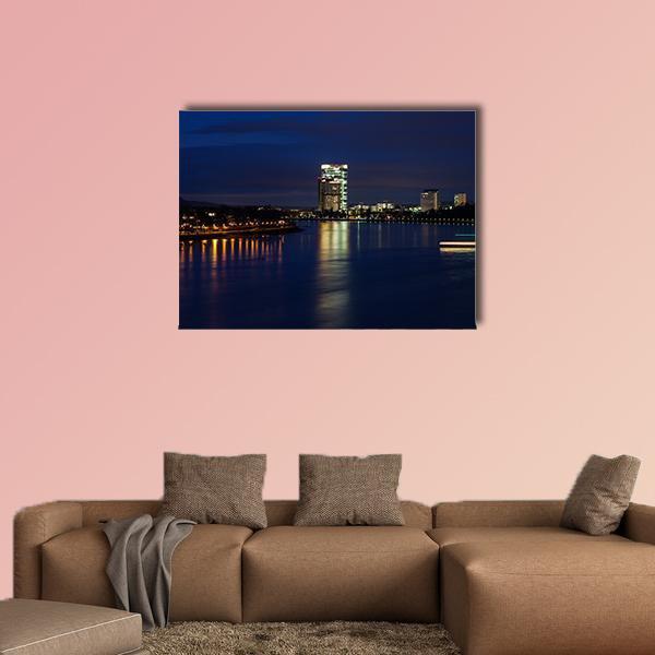 Rhine River at Night Canvas Wall Art in black, blue and navy, single panel hung on a wall