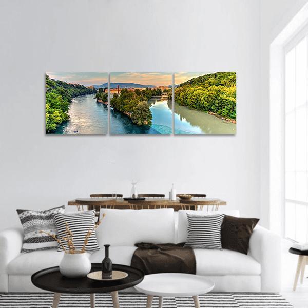 Rhone and Arve River Confluence Panoramic Canvas Wall Art in green and blue, hung on a wall