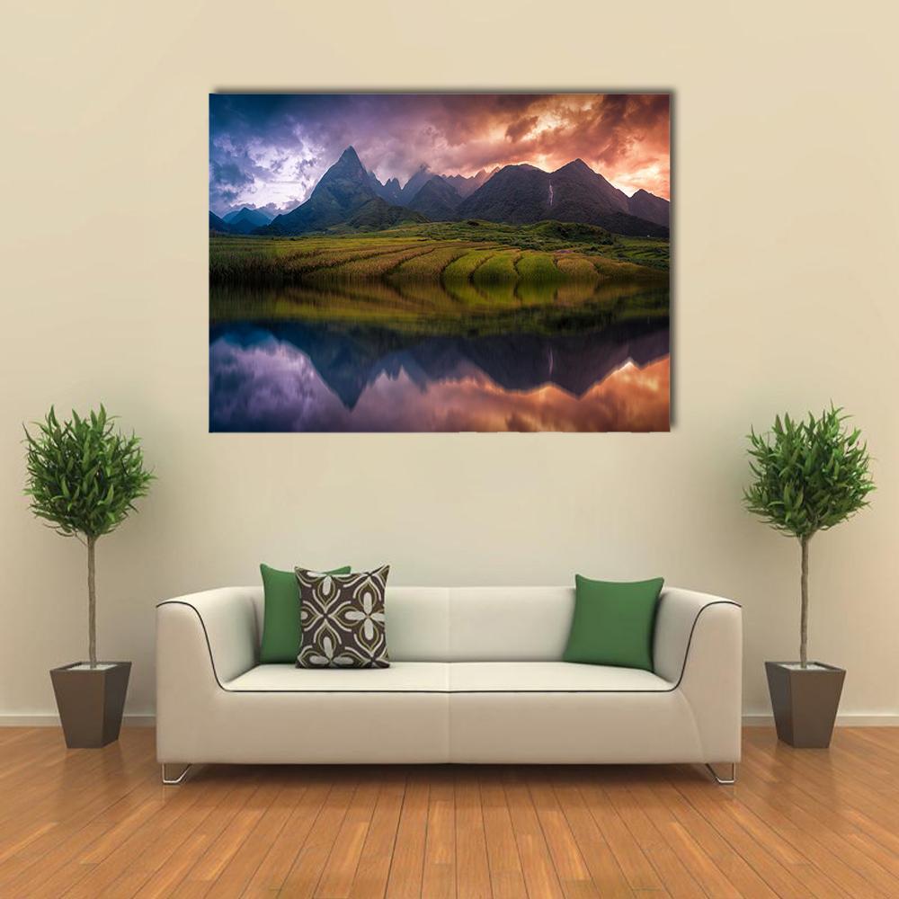 Terraced Rice Fields with Mountain Reflection Canvas Wall Art in orange, green and purple, single panel hung on a wall