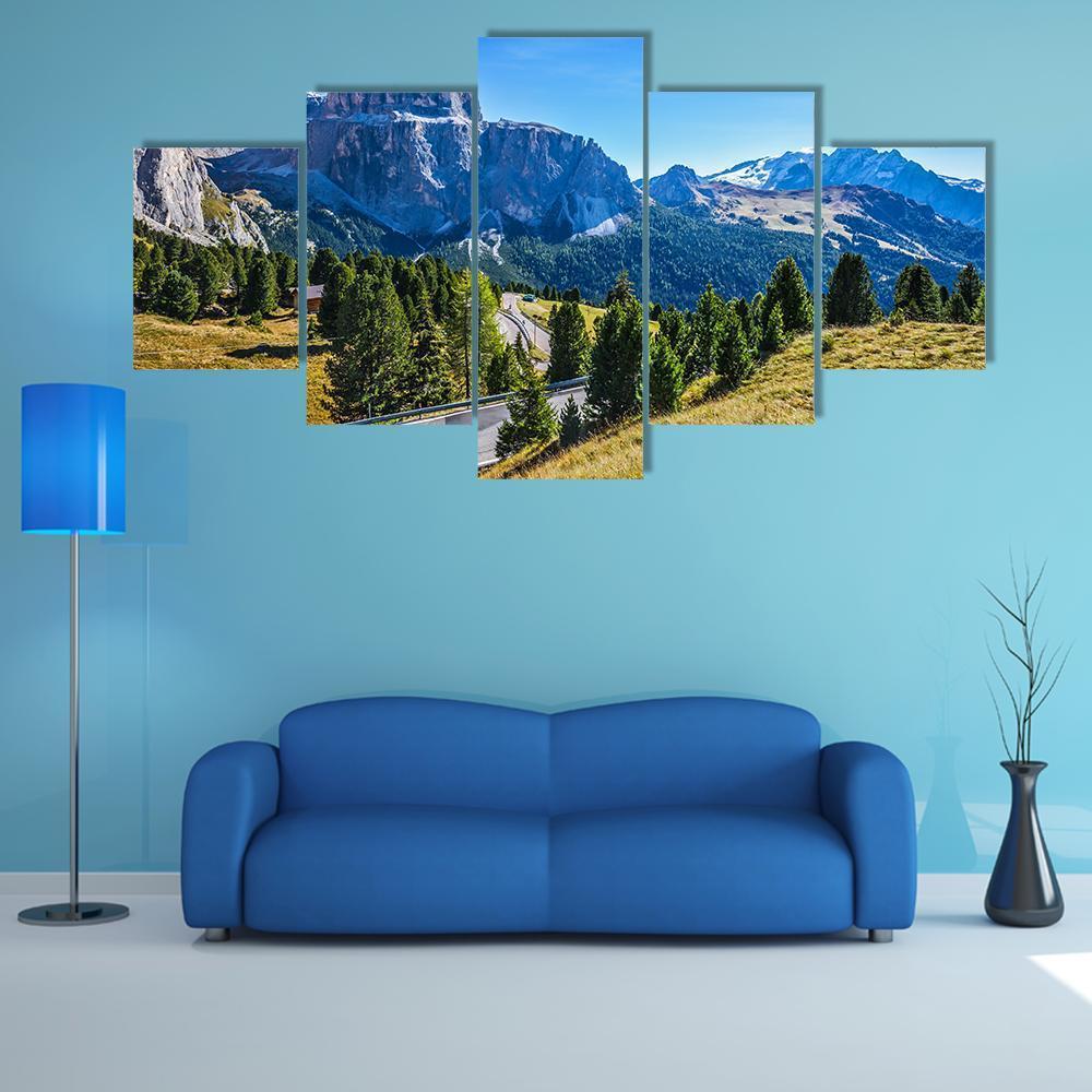 Dolomite Ridge with Winding Mountain Road Canvas Wall Art in gray, green and blue, 5 panel Star layout hung on a wall