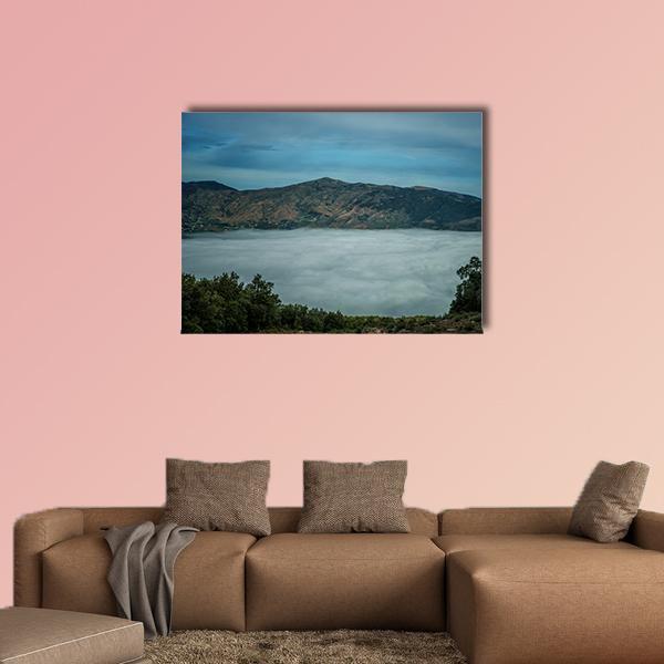 Rif Mountains with Misty Lake Canvas Wall Art in gray, green and blue, single panel hung on a wall