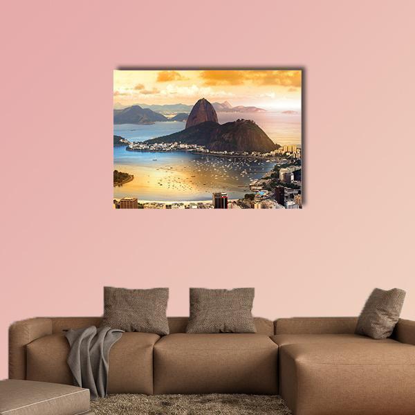 Rio De Janeiro Twilight Over Guanabara Bay Canvas Wall Art in orange, yellow and blue, single panel hung on a wall