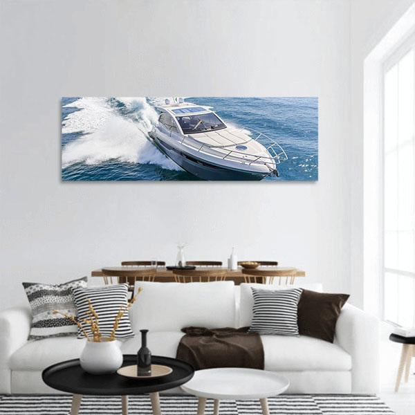 Rio Yachts Motor Yacht with White Water Wake Panoramic Canvas Wall Art in white and blue, hung on a wall