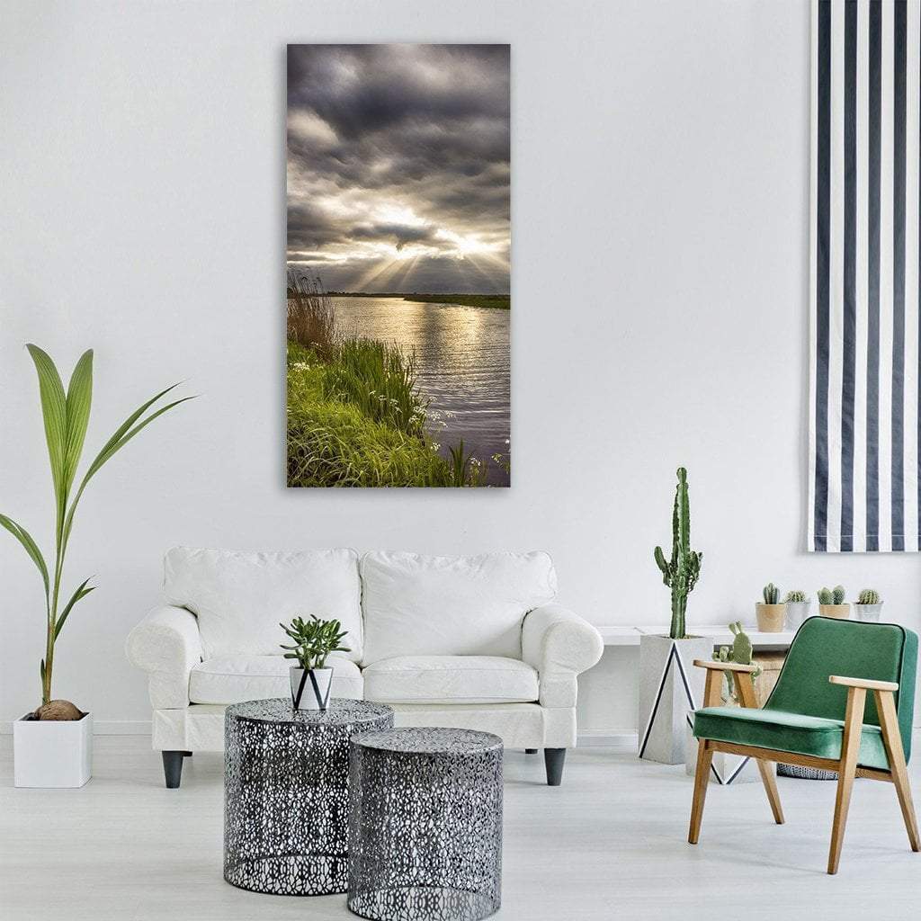 Sunbeams Over a Summer River Vertical Canvas Wall Art in gray, yellow and green, single vertical panel hung on a wall