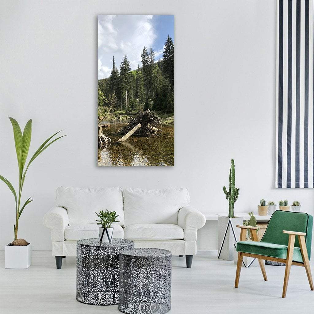 Summer Woodland Stream with Tree Stump Vertical Canvas Wall Art in brown, green and blue, single vertical panel hung on a wall