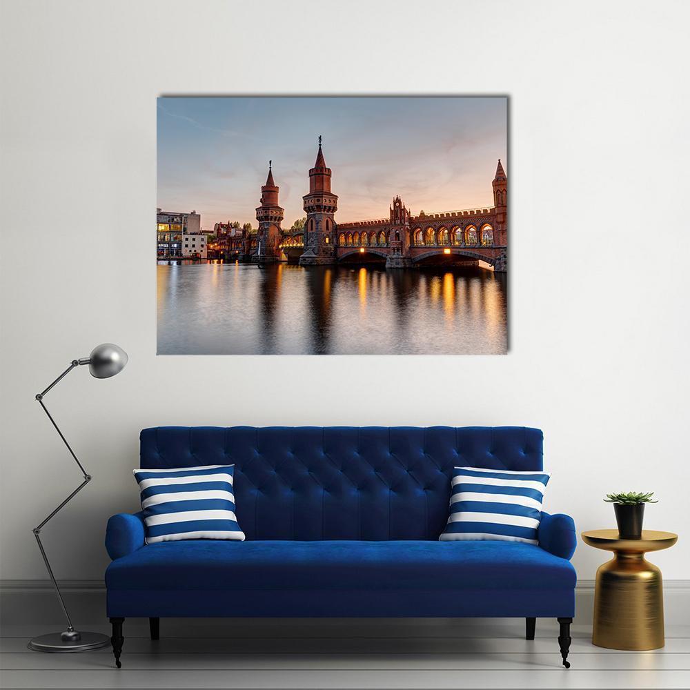 River Spree and Oberbaum Bridge Canvas Wall Art in brown, orange and blue, single panel hung on a wall