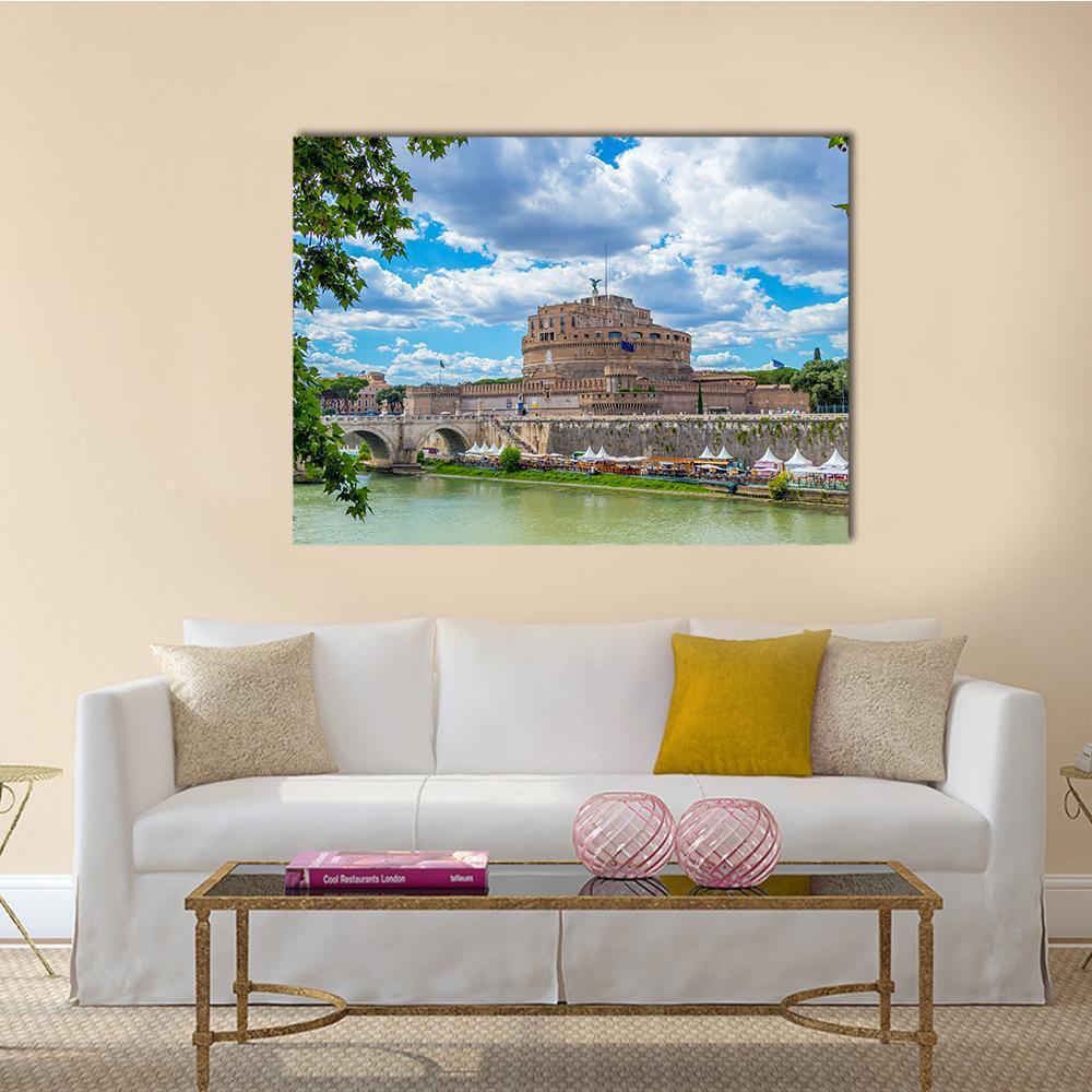 Castel Sant'angelo and the Tiber River Canvas Wall Art in brown, green and blue, single panel hung on a wall