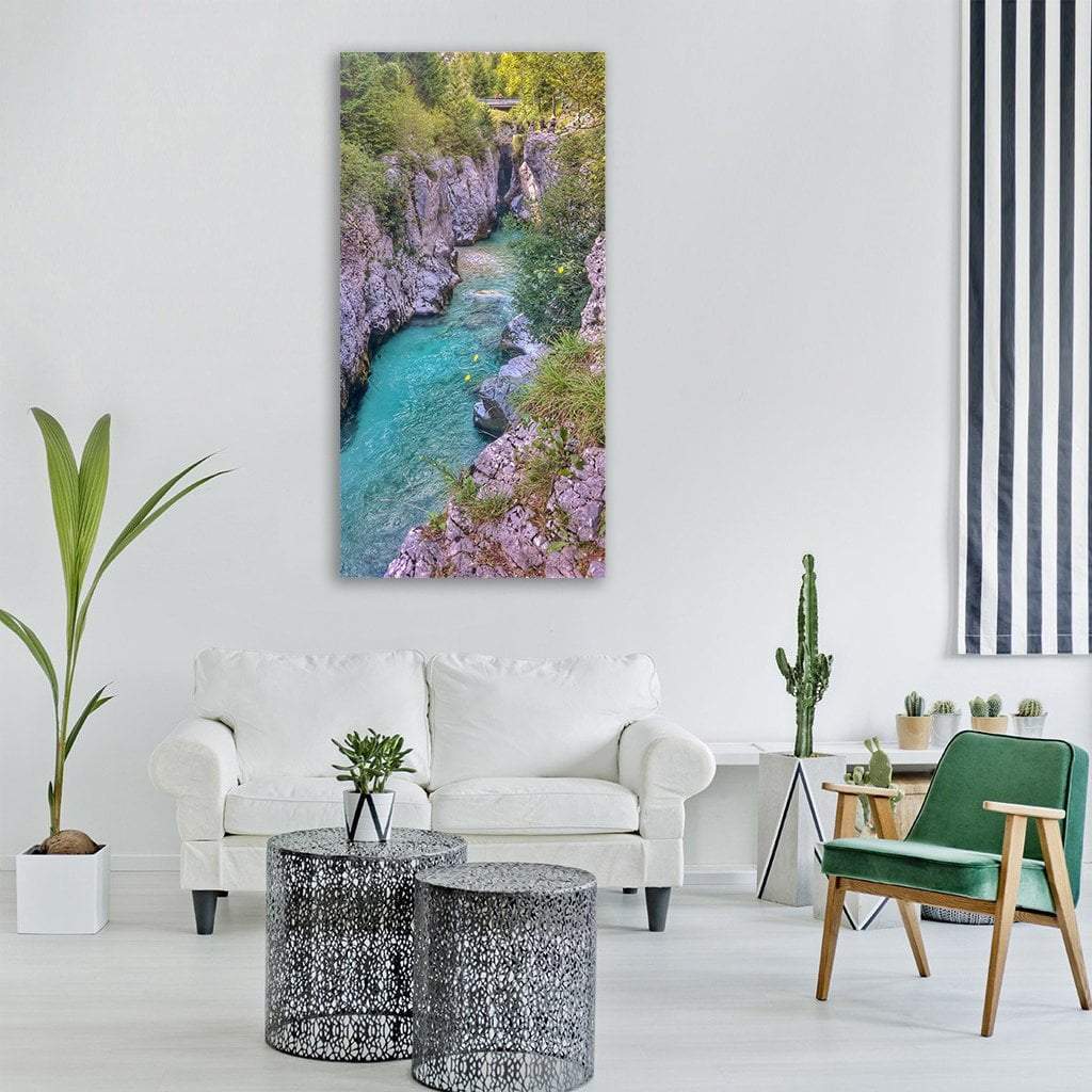 Turquoise River Through Rocky Gorge Vertical Canvas Wall Art in gray, green and blue, single vertical panel hung on a wall