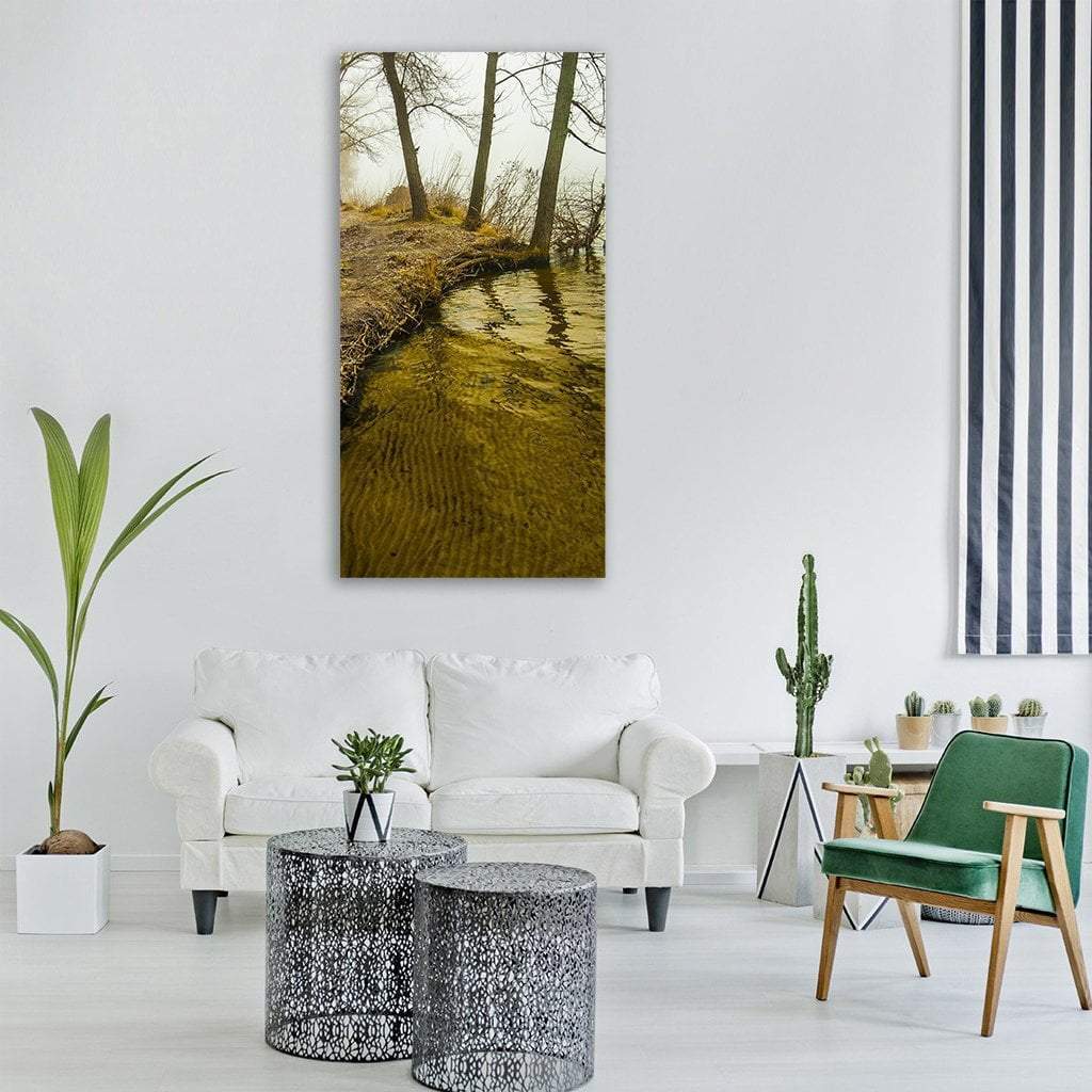 River Wood Landscape Vertical Canvas Wall Art in gray, brown and yellow, single vertical panel hung on a wall