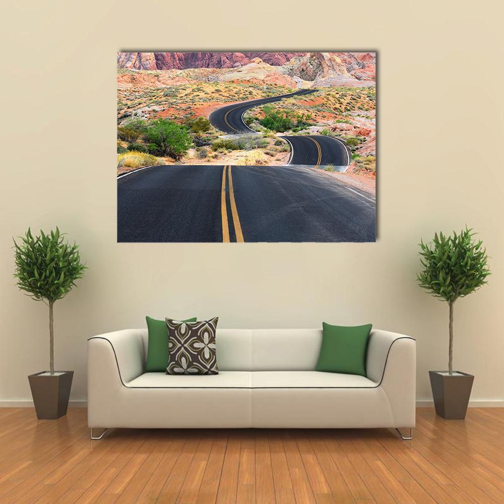 Winding Desert Road in Valley of Fire Canvas Wall Art in black, red and orange, single panel hung on a wall