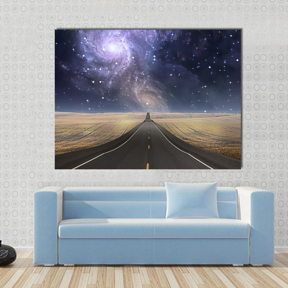 Road to Galaxy Canvas Wall Art in black, yellow and purple, single panel hung on a wall