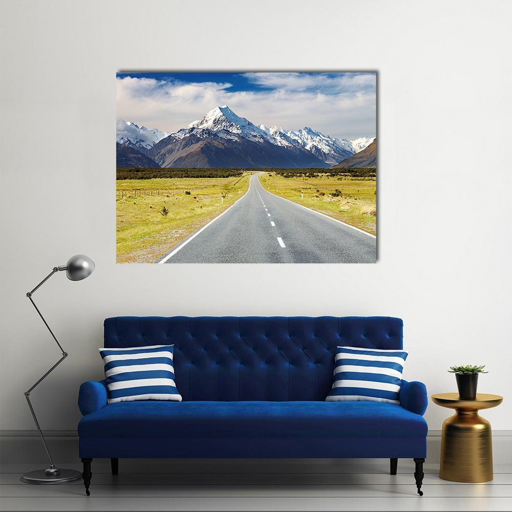 Road to Mount Cook Canvas Wall Art in gray, yellow and blue, single panel hung on a wall