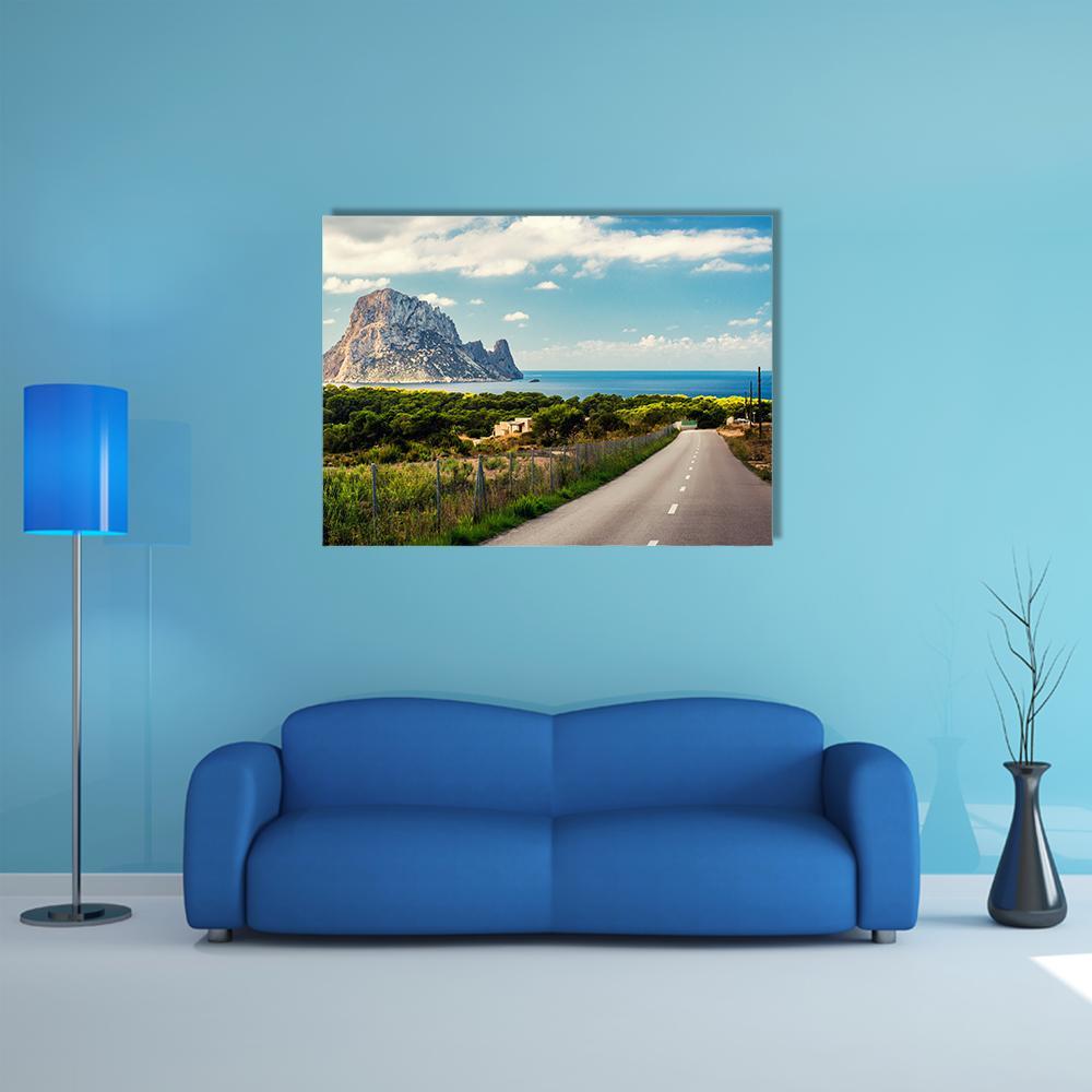 Winding Road to Rocky Coastal Island Canvas Wall Art in gray, green and blue, single panel hung on a wall