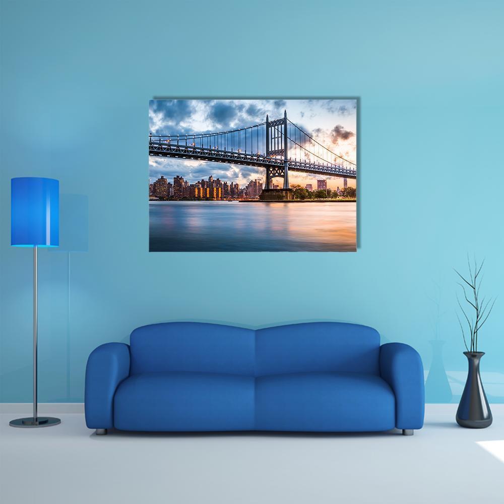 Robert F Kennedy Bridge at Dusk Canvas Wall Art in black, orange and blue, single panel hung on a wall